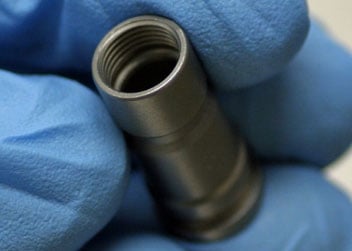 Plastic Bonded to Metal: When is clean really clean?