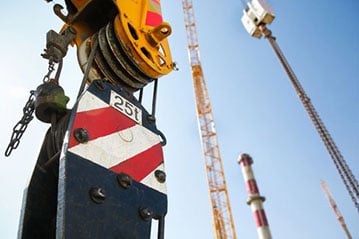 Pulley on a heavy duty mobile lifting crane on a construction site