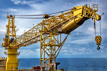 Pedestal crane winch with steel wire rope on an offshore energy production platform