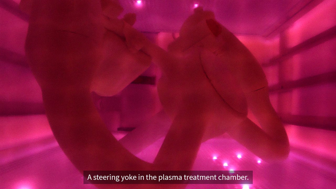 A steering yoke in the plasma treatment chamber